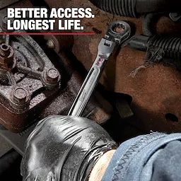 A mechanic uses a Mechanic Hand Tool to work on a rusted engine part. They use a ratcheting wrench to turn a bolt. Text in the image reads, "Better access. Longest life."