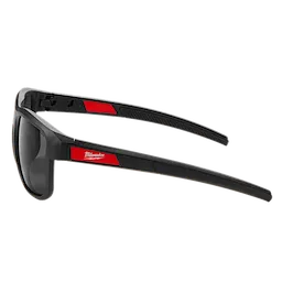 Full Frame Safety Glasses with Removable Side Shields – Tinted Anti-Scratch Lenses feature a black frame with red accents. The glasses include dark tinted lenses and detachable side shields for added protection. Branded text in white appears on the red sections of the temples.