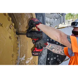 M18 FUEL 3/4" Extended Anvil High Torque Impact Wrench w/ ONE-KEY used on large bolted machinery wheel.